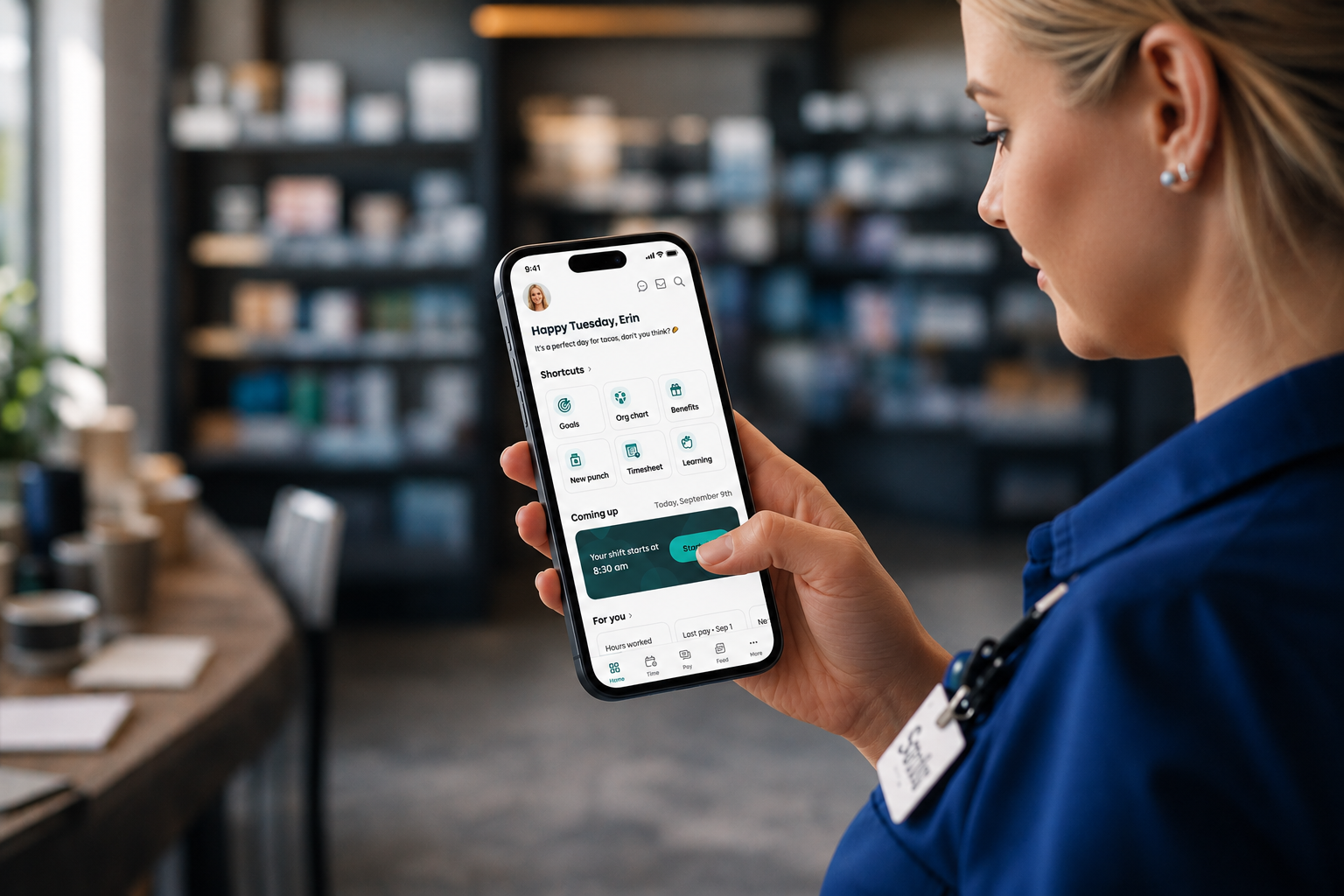 Employee mobile experience hero showing a frontline worker using the UKG mobile app